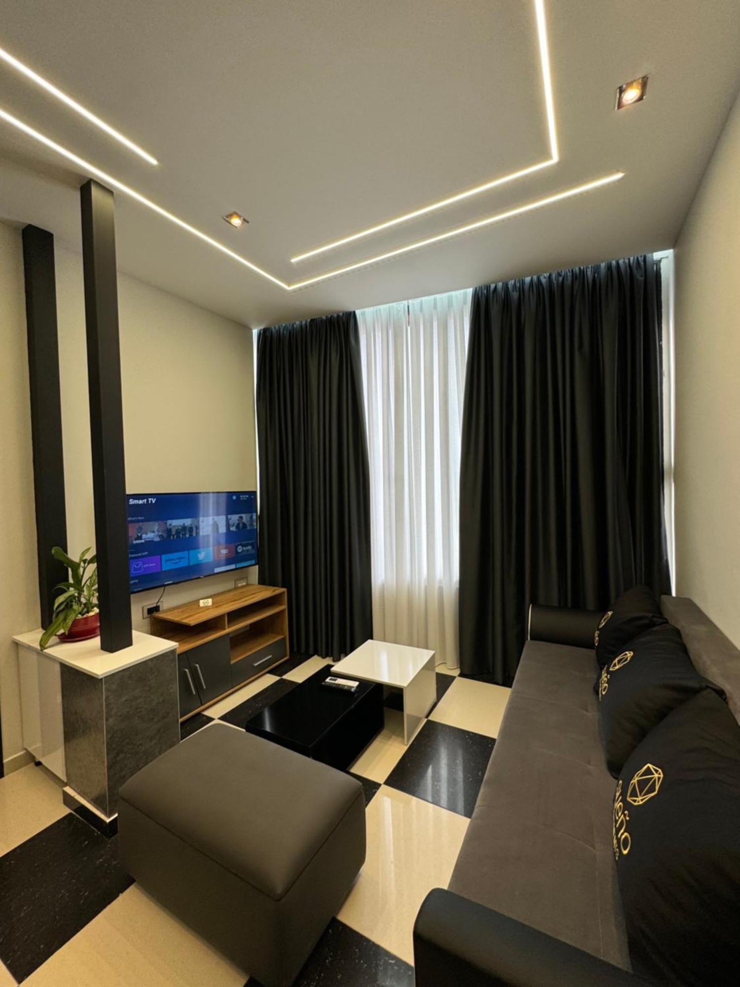 Sueno Apartments & Suites Tirana Rum bild