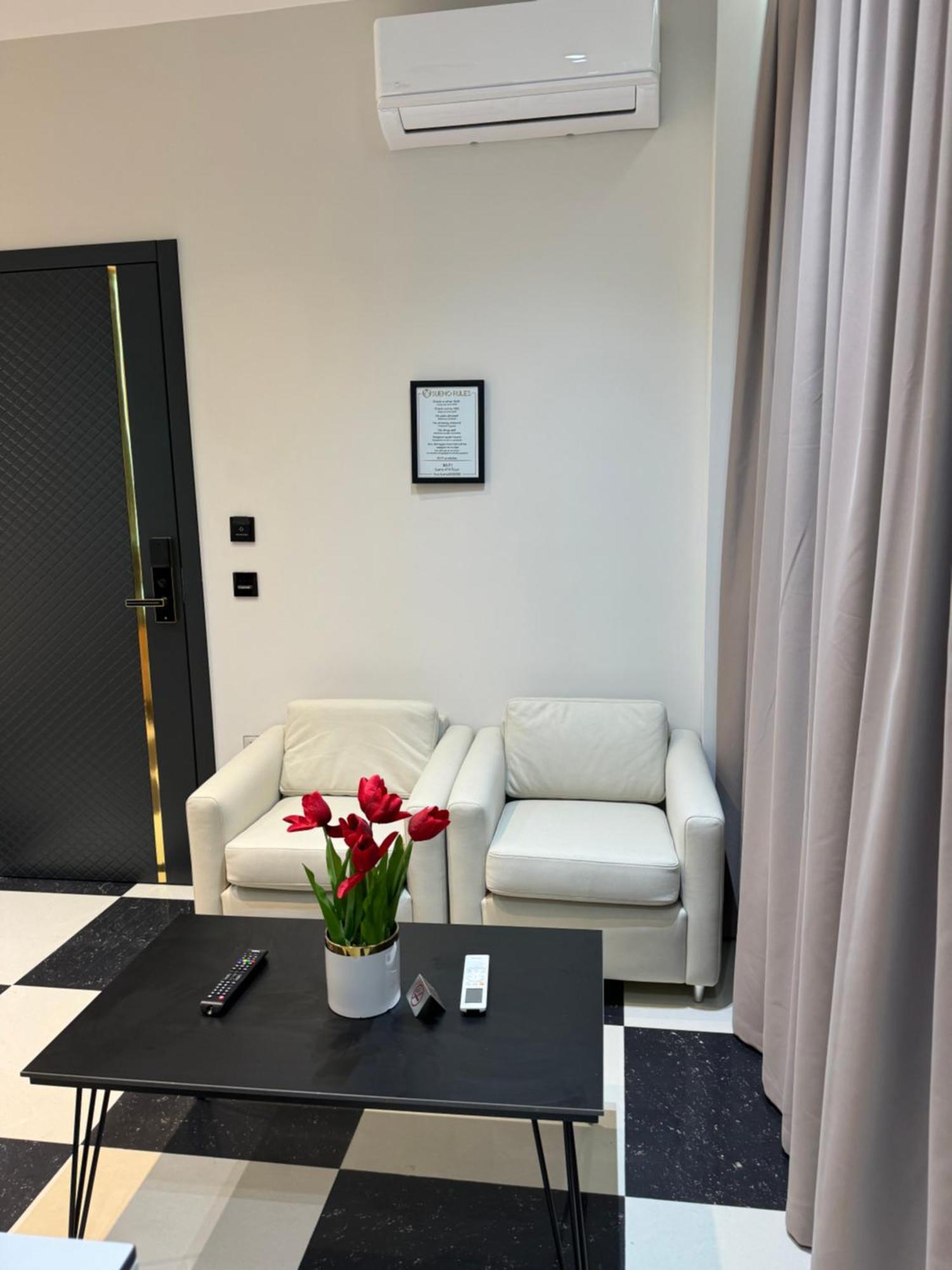 Sueno Apartments & Suites Tirana Rum bild