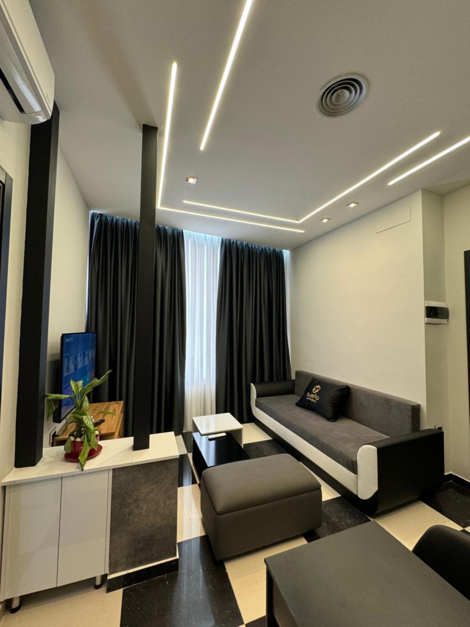 Sueno Apartments & Suites Tirana Rum bild