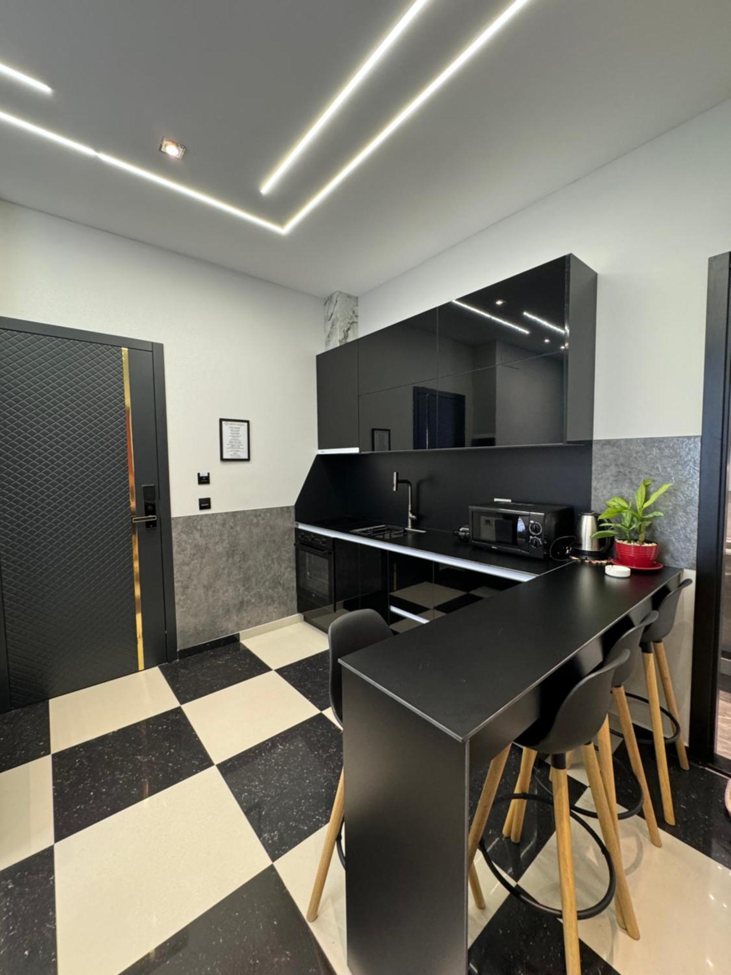 Sueno Apartments & Suites Tirana Rum bild
